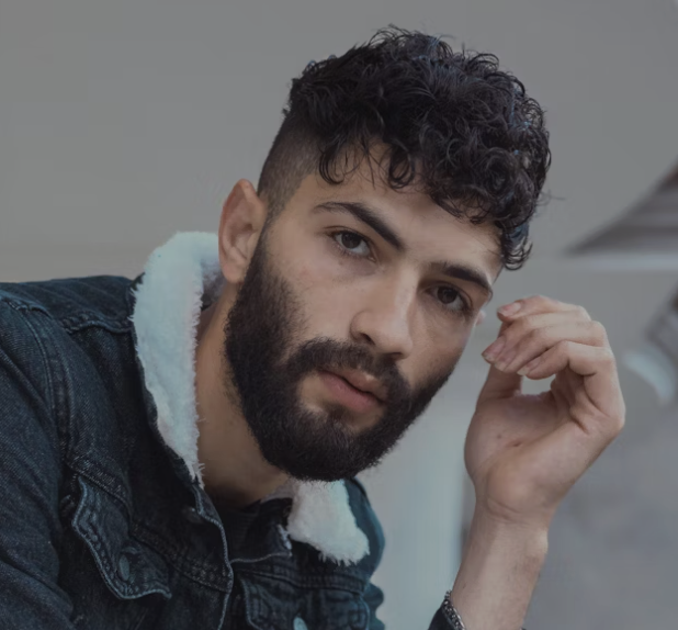 Bearded man looking down